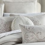 Angeline Tufted Round Decorative Throw Pillow in Ivory by J.Queen New York