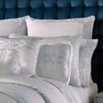 Becco Bolster Decorative Throw Pillow in White | Satin by J.Queen New York